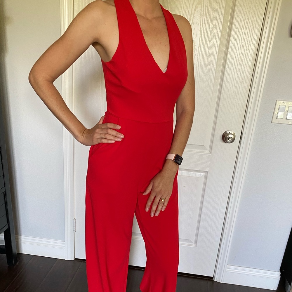 New red jumpsuit open in the back
